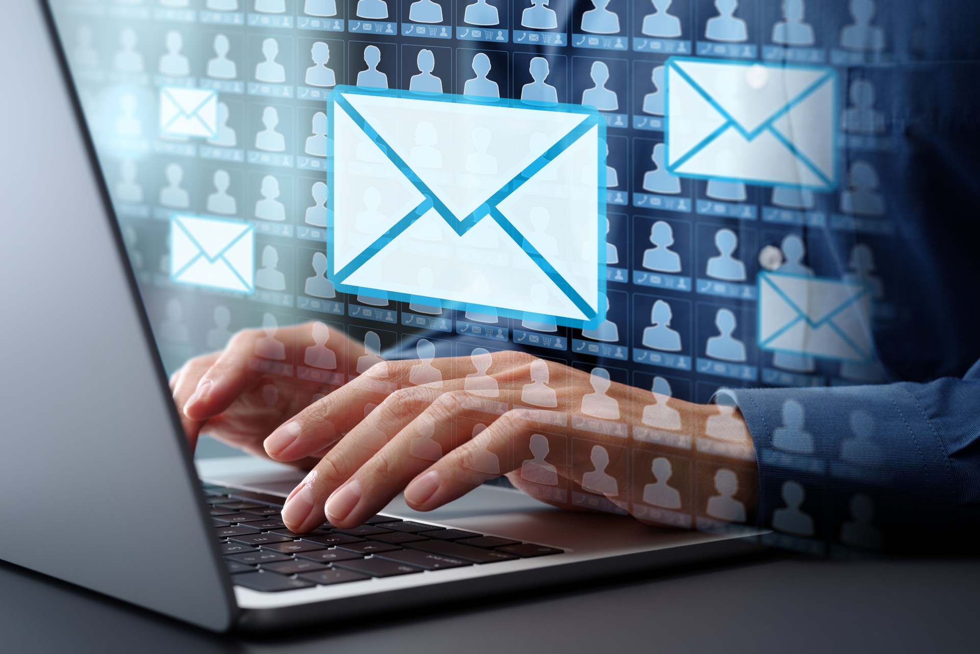 Email marketing automation technology and customer database. Businessman typing on laptop computer keyboard at desk in office.